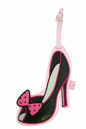 Free Pin Up style luggage tag with purchase at Bliss or Curvy